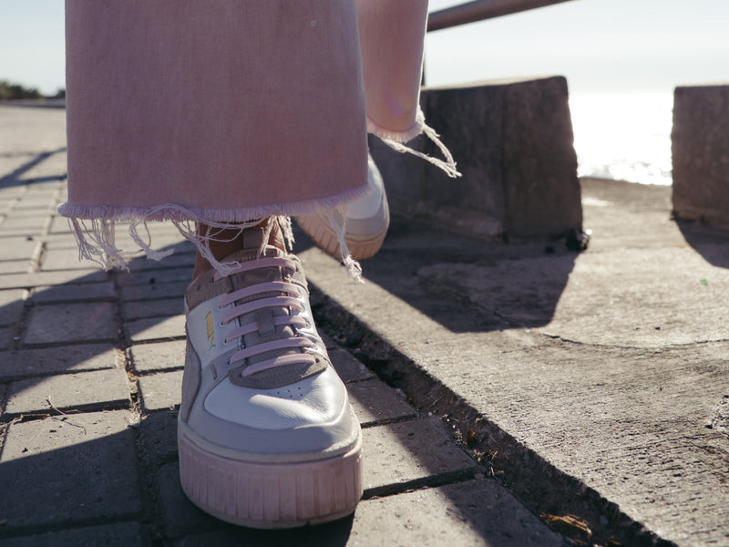 White sneaker with Tekkie Ties no-tie laces in the sun